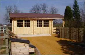 Garage / Workshop log cabin, Torwood Country Lodges