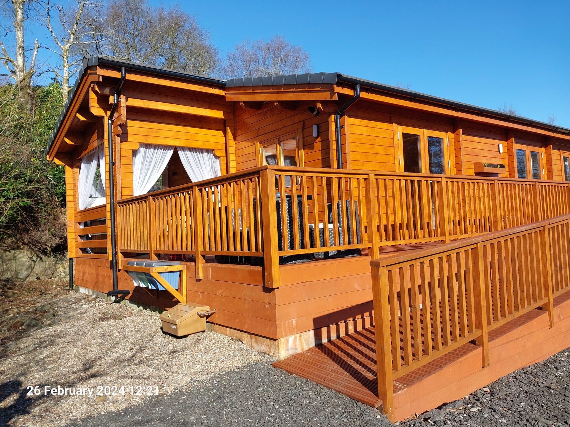 Little Lodge timber holiday lodge with decking at Torwood Country Lodges, Dumfries and Galloway