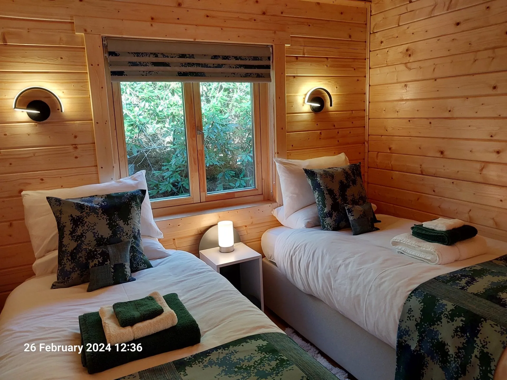 Twin bedroom inside Little Lodge, Torwood Country Lodges