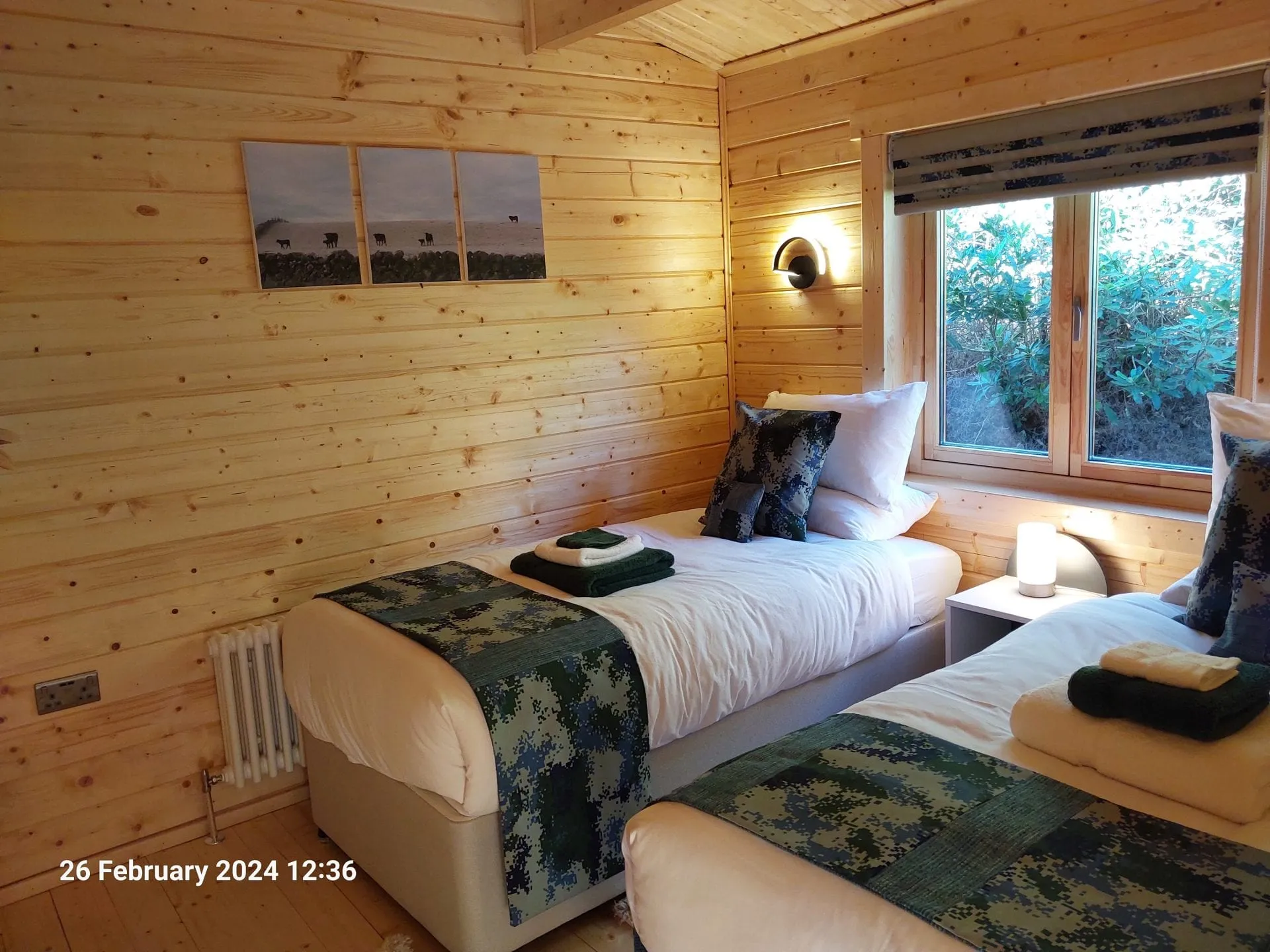 Twin bedroom with two single beds in Little Lodge, Torwood Country Lodges, Newton Stewart