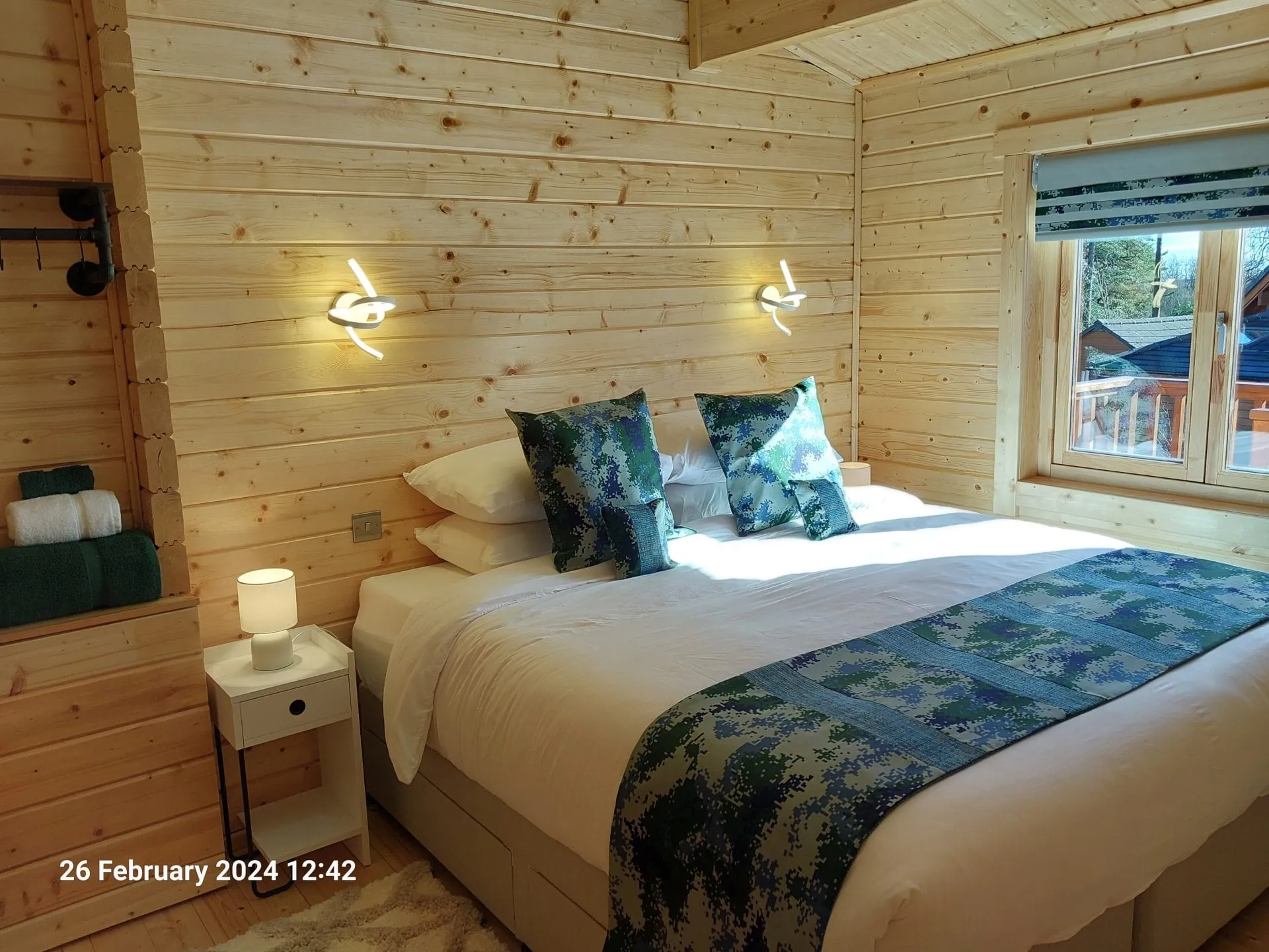 Super king bedroom with cotton bed linen in Little Lodge, Torwood Country Lodges, Newton Stewart