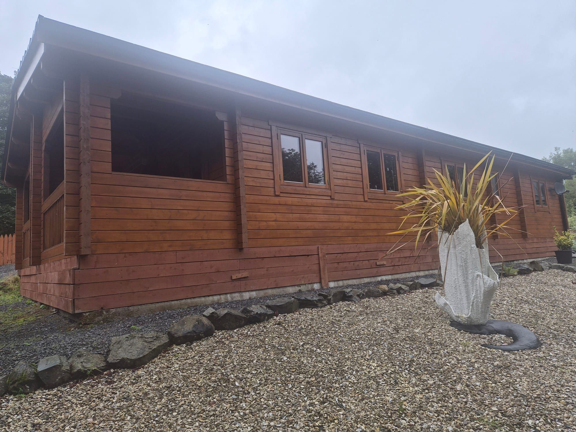 Completed solid timber lodge at Torwood Country Lodges, Newton Stewart