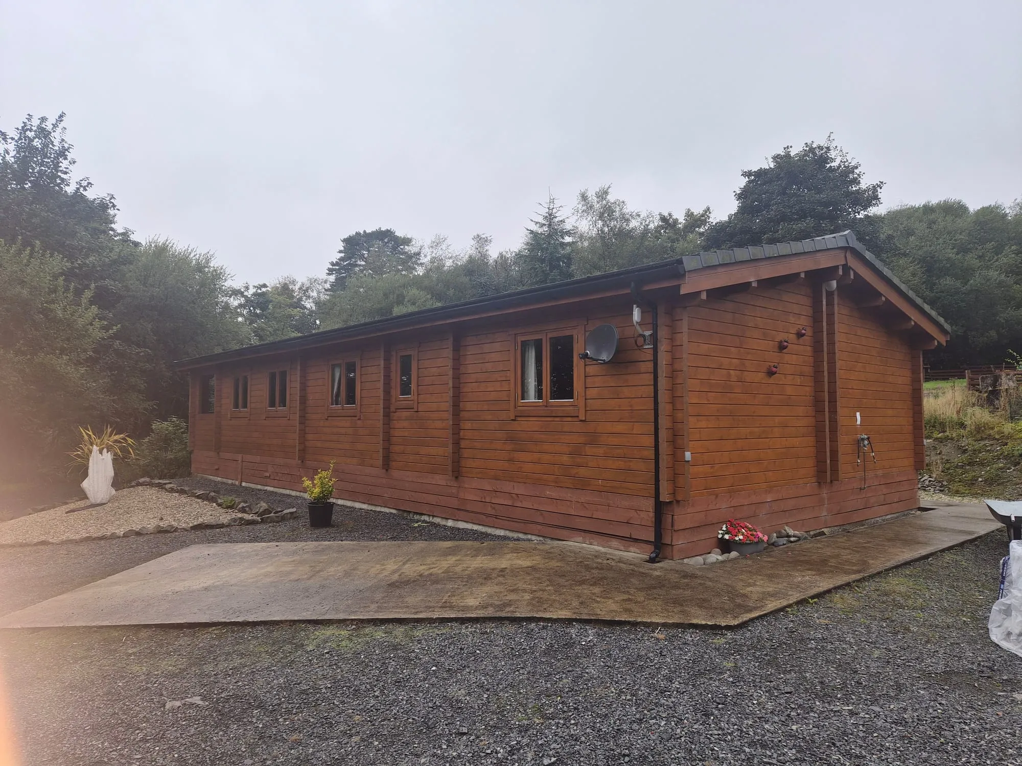 Solid timber lodge built on a freehold plot at Torwood Country Lodges